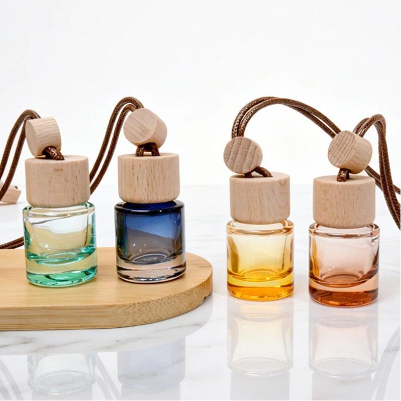 Car Fragrance Diffuser - زجاجة عطر صغيرة مستديرة للسيارة، ناشر